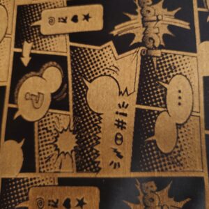 Tkanina obiciowa zasłonowa złoto czarny motyw komiksu cena za 0,5m OB25