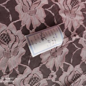 Tkanina gipiura koronka  łososiowy cena za 05,mb kwiaty (KO6)